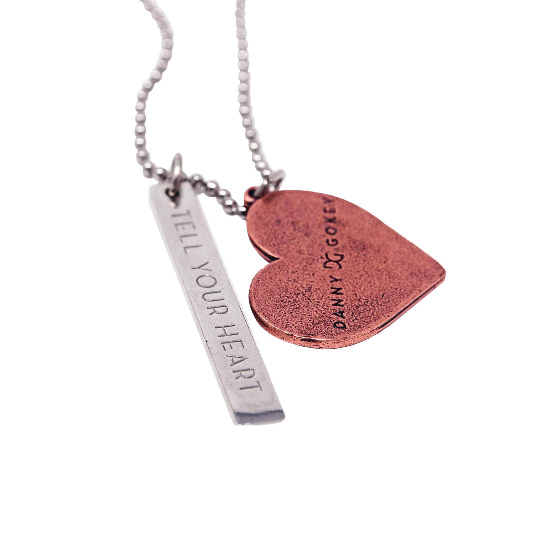 Tell your heart to beat again two charm pink heart necklace product shot Danny Gokey